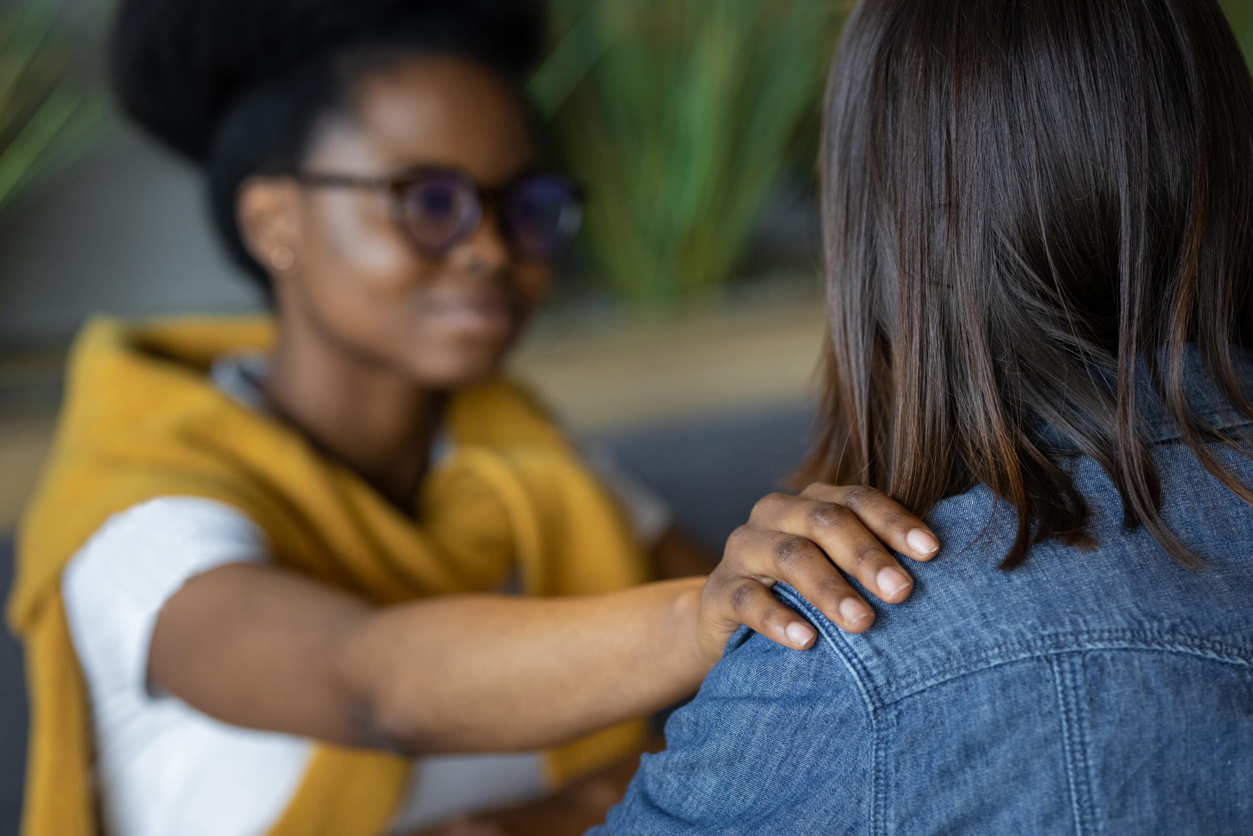 African American woman psychologist supports her patient