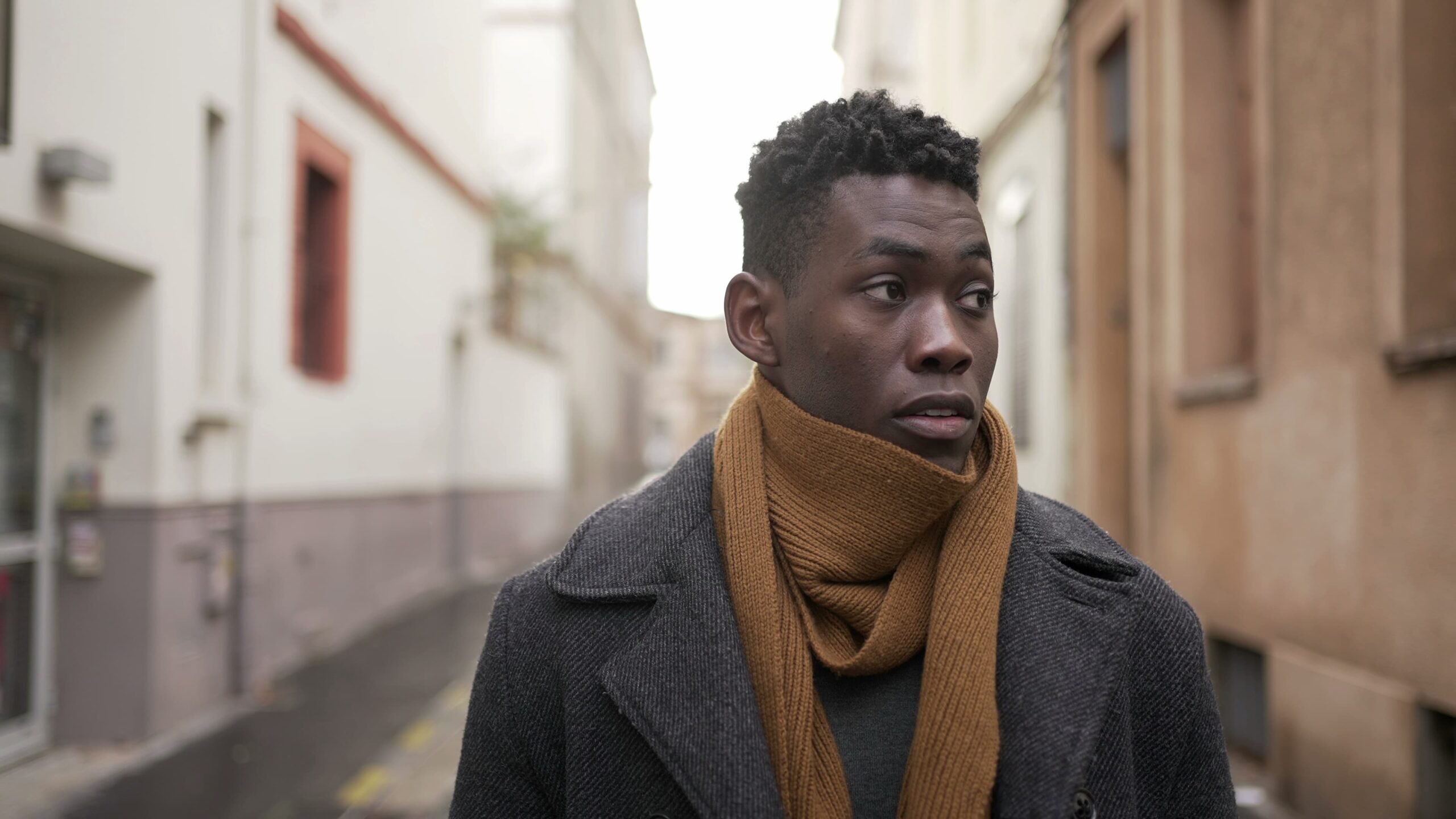 Person learning to spot hidden triggers in their environment during addiction recovery